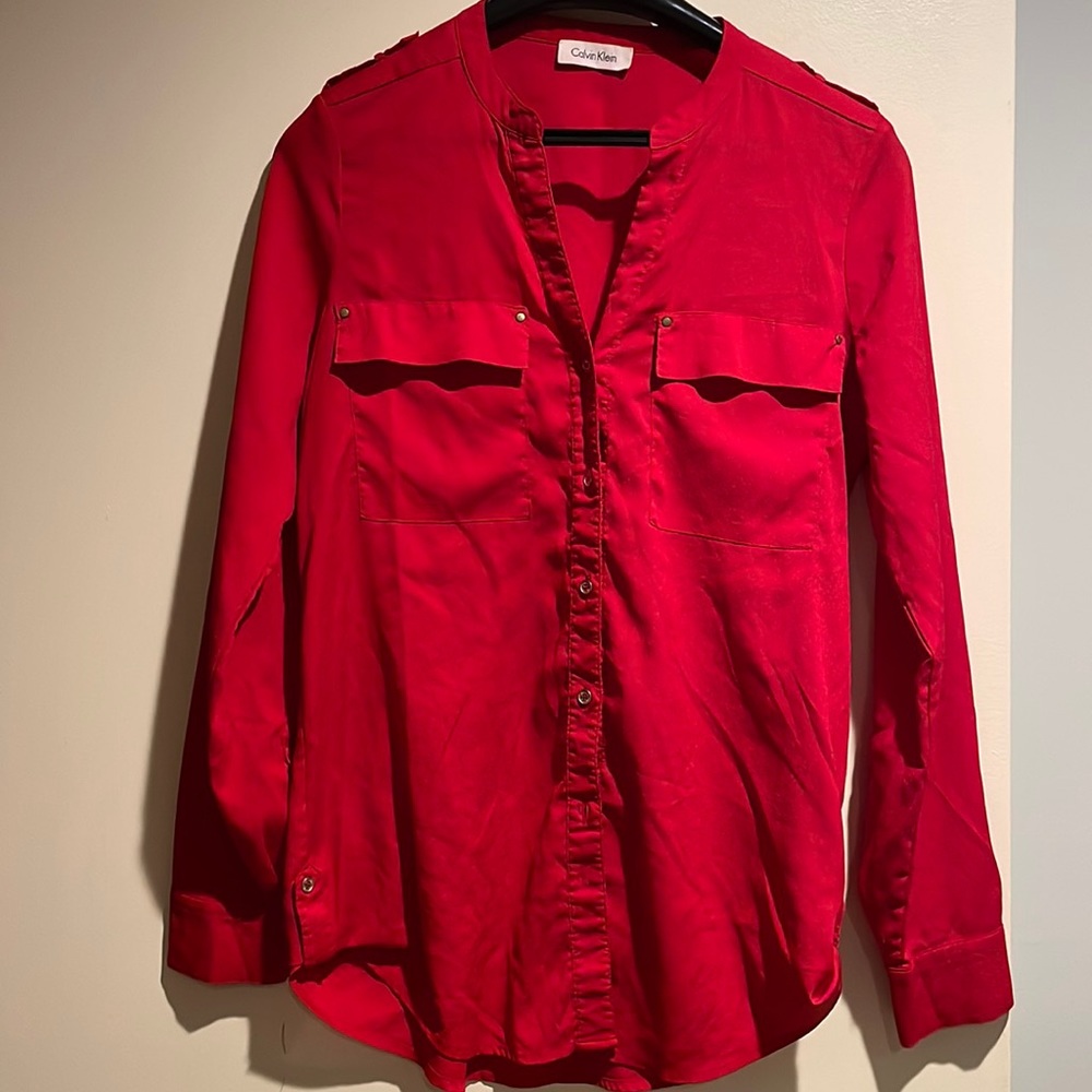 Red long sleeve shirt with slender gold button details